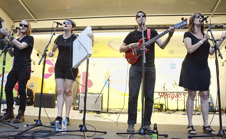The Pizza Underground performing