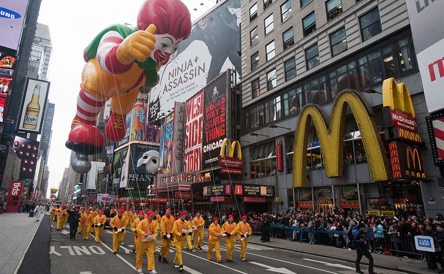 A Ronald McDonald parade float going passed a McDonald’s in New York at the Macy’s Thanksgiving Day Parade.