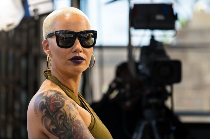 Amber Rose wearing dark sunglasses