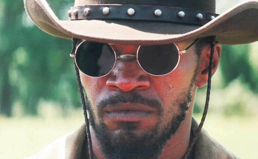 Jamie Foxx wearing circular sunglasses in the film Django Unchained