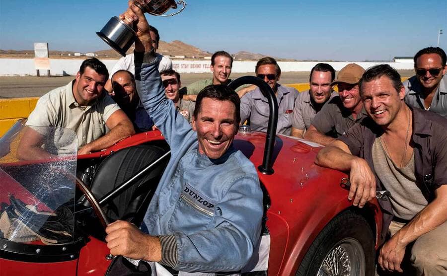 A scene from Ford v Ferrari with Christian Bale as Ken Miles in the driver’s seat