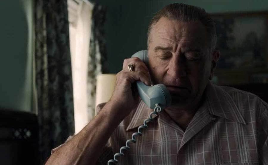 Robert DeNiro as Frank Sheeran on the phone in The Irishman