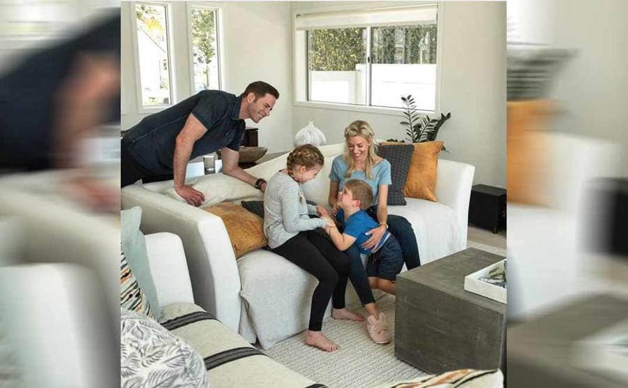 Tarek, Heather, and his children playing in the living room