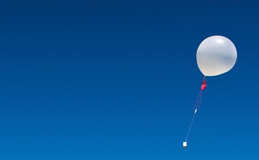 A single weather balloon in the sky