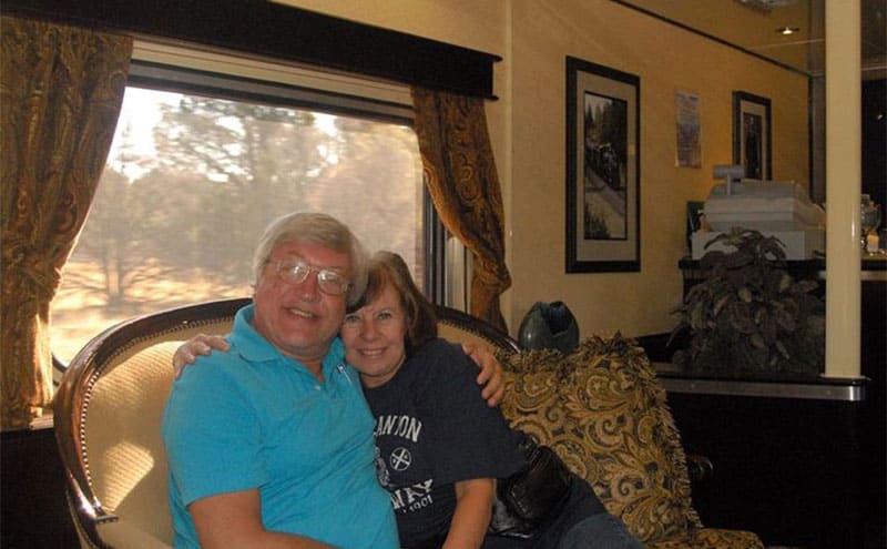 Terry and Linda sitting on a couch