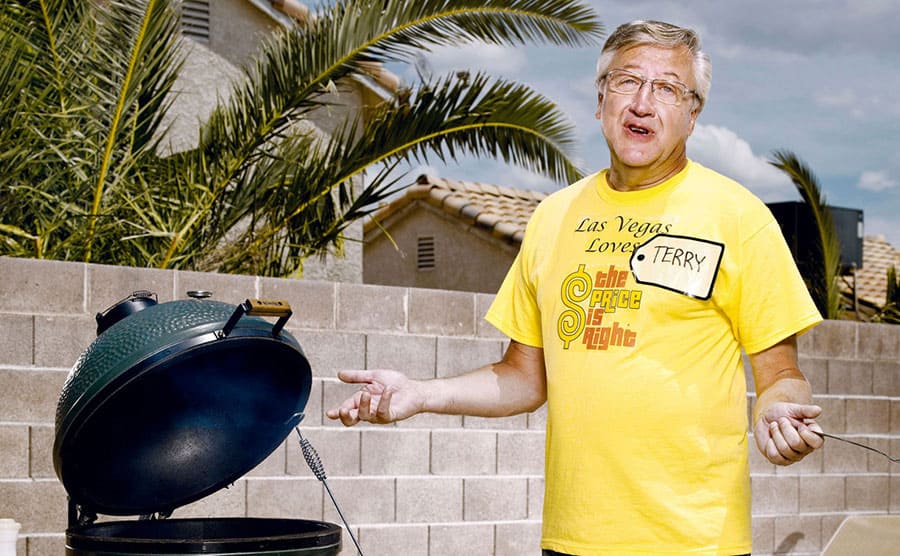 Terry standing in front of the green egg grill
