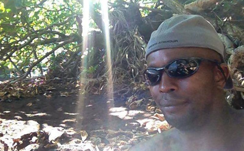 Frederico Bailey taking a selfie in the woods