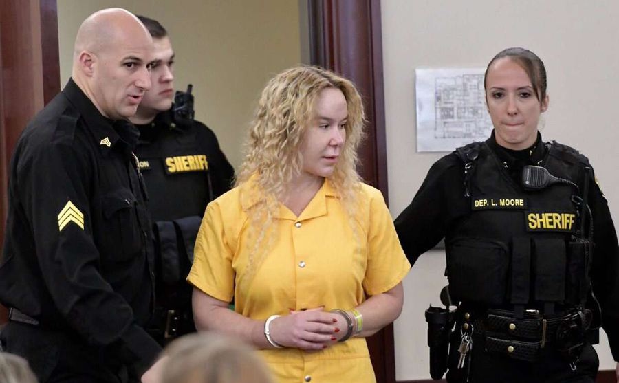 Alexandria being led in court by sheriffs