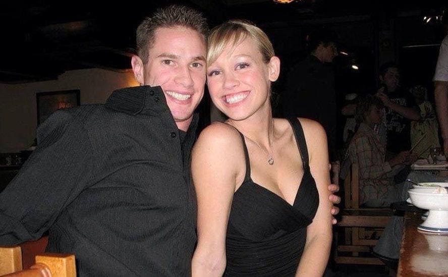 Sherri and Her husband Keith hugging and smiling