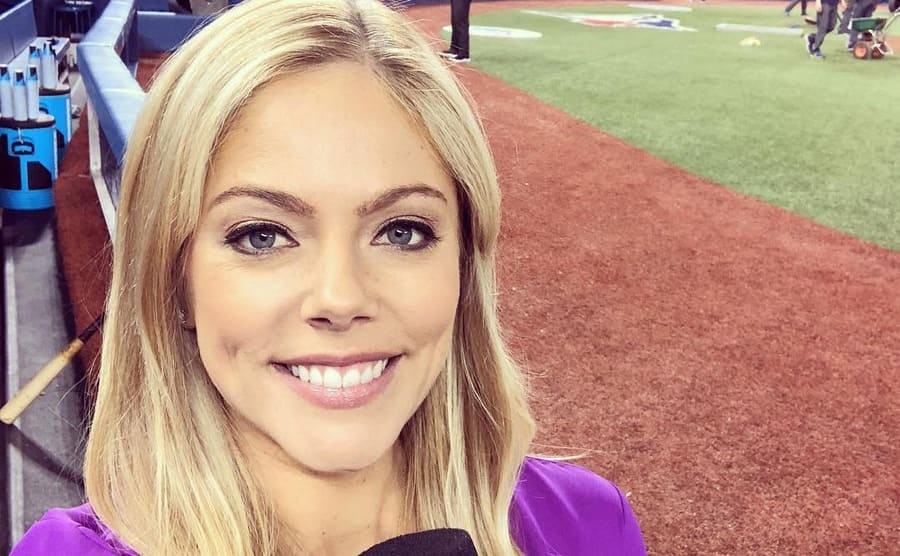 Alexa Datt smiling in a broadcast studio 