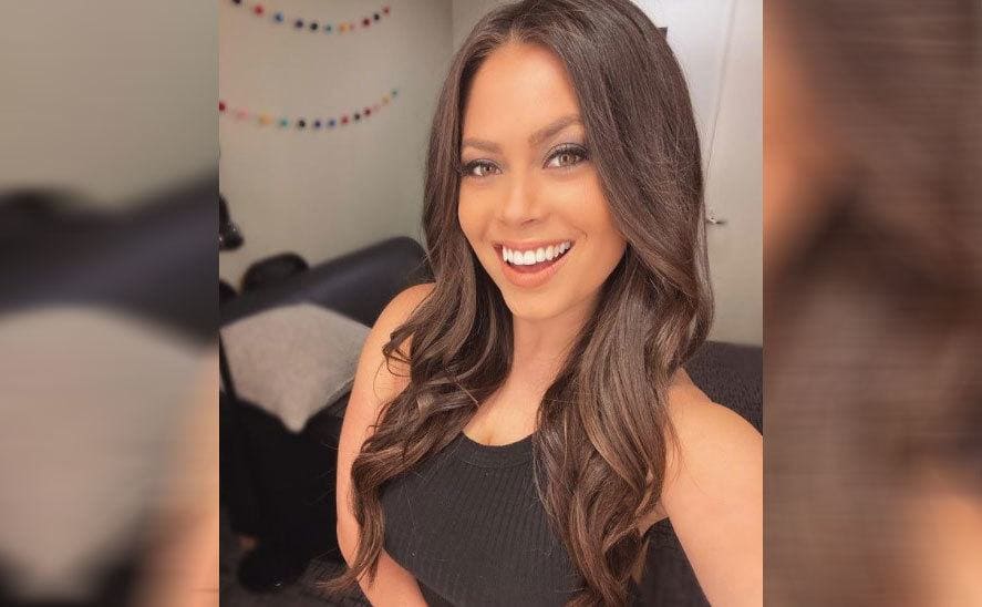 Alex Curry in a self-portrait smiling