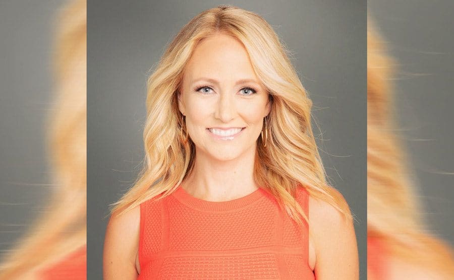 A portrait of Lindsay Rhodes smiling