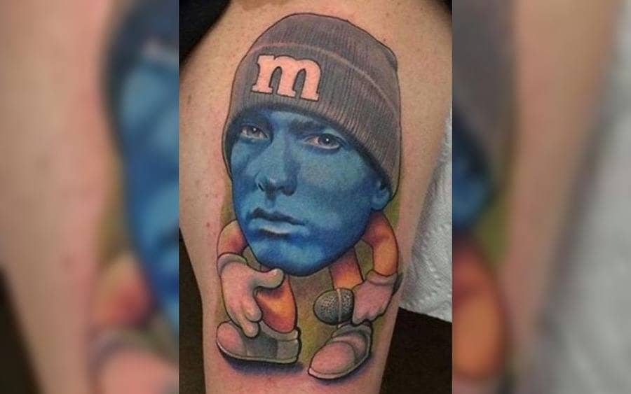 A tattoo of Eminem as an M&M