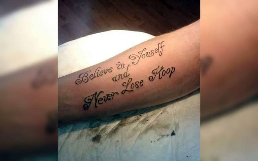 A tattoo that reads 