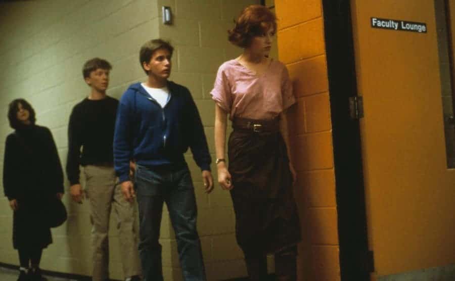 The cast of the Breakfast Club sneaking past the faculty loungue
