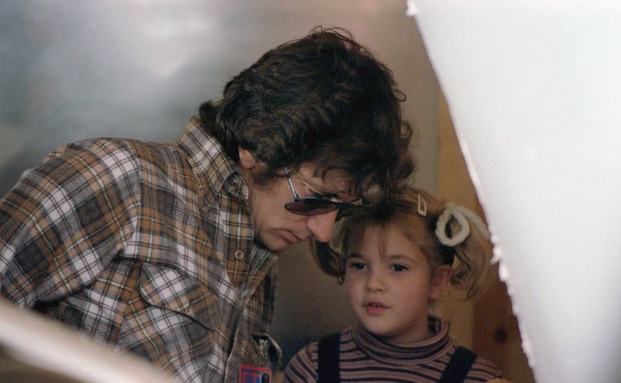 Steven Spielberg and Drew Barrymore on the set of E.T. in 1982