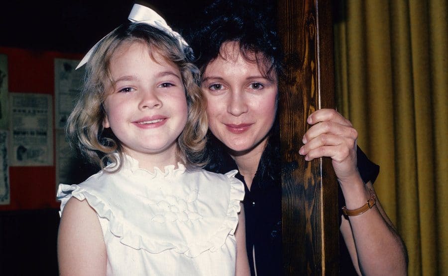 Drew Barrymore and her mother Jaid Barrymore posing backstage at an event