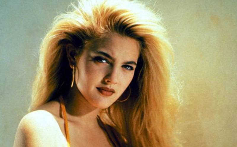 Drew Barrymore posing in a portrait for the film Poison Ivy