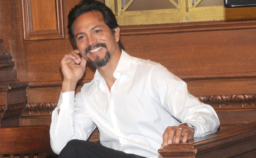 Benjamin Bratt as Rey Curtis sitting in the courtroom