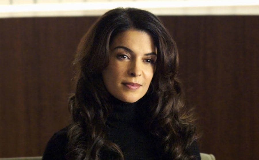 Annabella Sciorra, who plays Caroline Barek, sitting in a courtroom