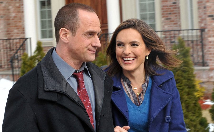 Christopher Meloni and Mariska Hargitay sharing a joke on the set of Law and Order