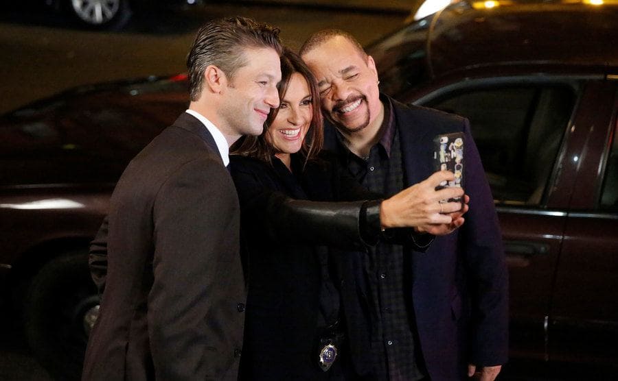 Peter Scanavino, Mariska Hargitay, and Ice-T taking a selfie behind the scenes on Law and Order