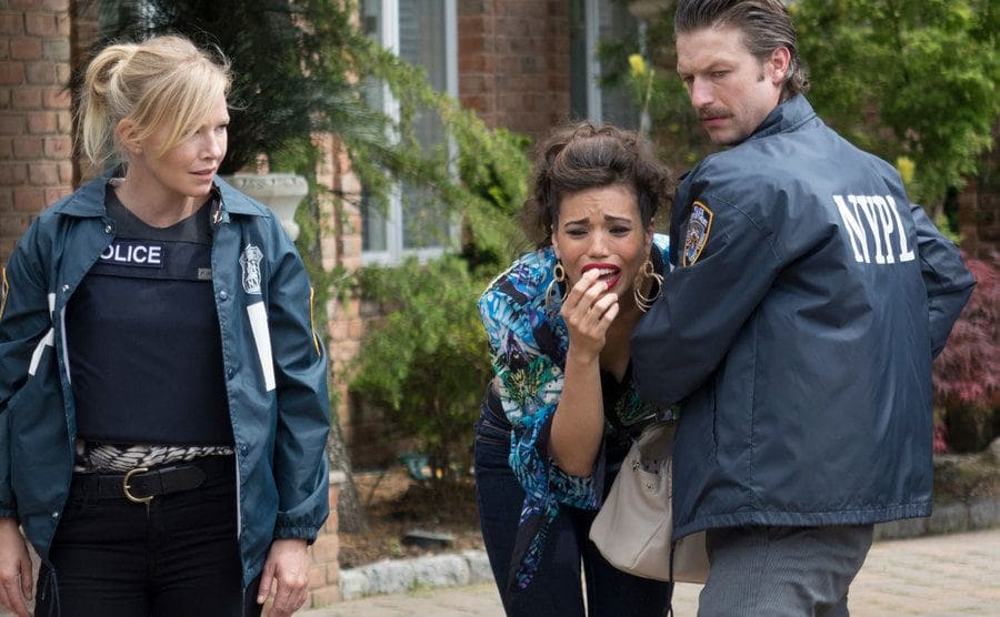 Amanda Rollins and Carisi comforting an upset woman