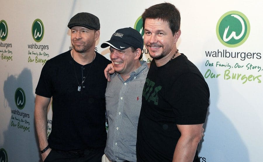 Donnie, Paul, and Mark Wahlberg on the red carpet together at a Wahlburger event