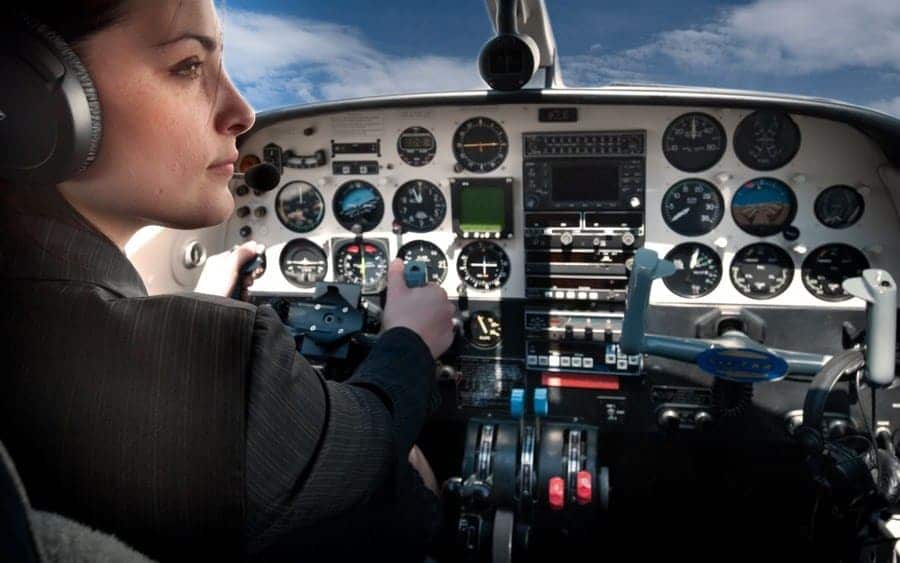 Businesswoman with a plane