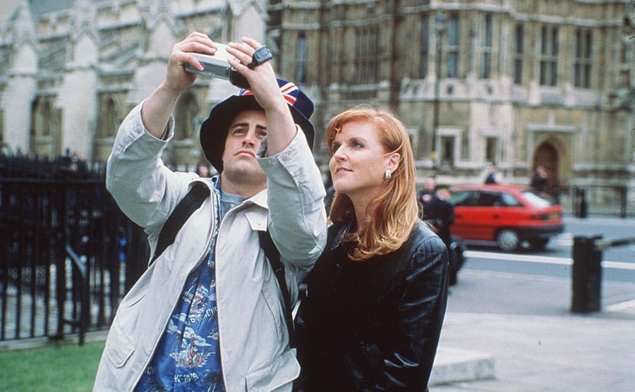 Sarah Ferguson and Matt LeBlanc taking a selfie in a scene from Friends 