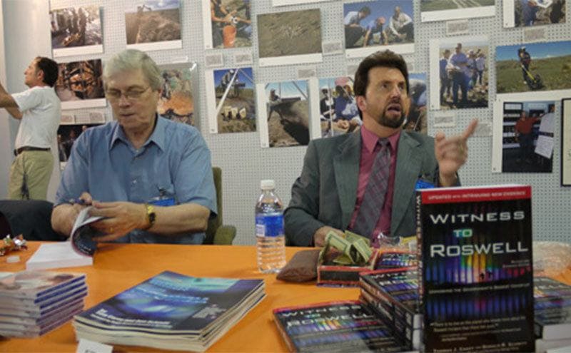 Don Schmitt and Tom Carey is signing books and talking to visitors in the Roswell UFO Museum.