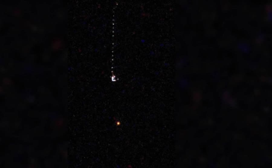 The unidentified object is flying over Lake Superior at night.