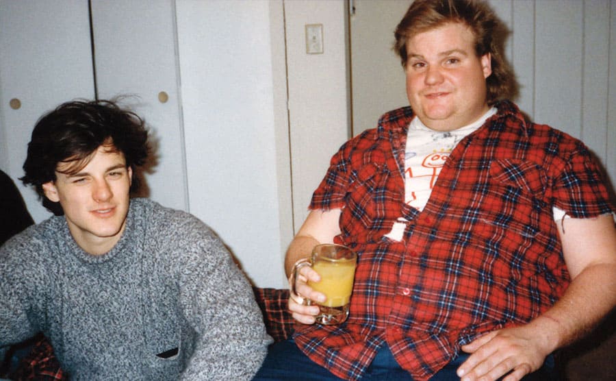 Chris Farley with a friend in college