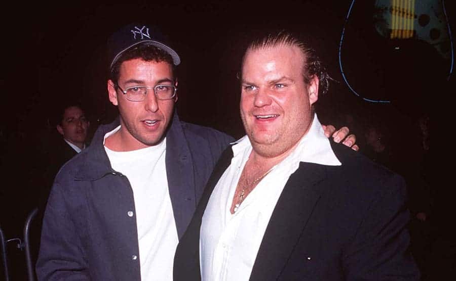 Adam Sandler and Chris Farley walking up to an event together