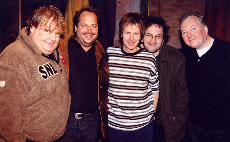Chris Farley with Jon Lovitz, Dana Carvey, and two other men