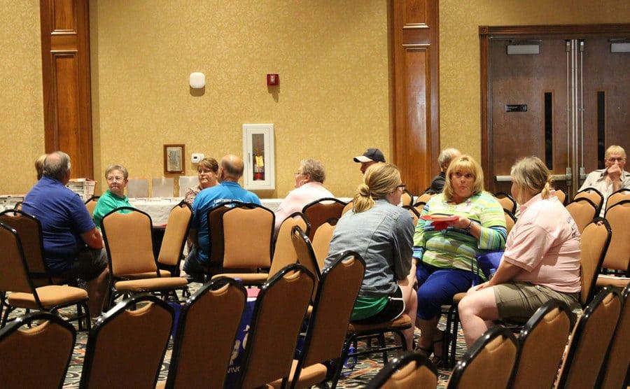 Members of the ‘LS&ESSI’ sitting and having conversations during the conference. 