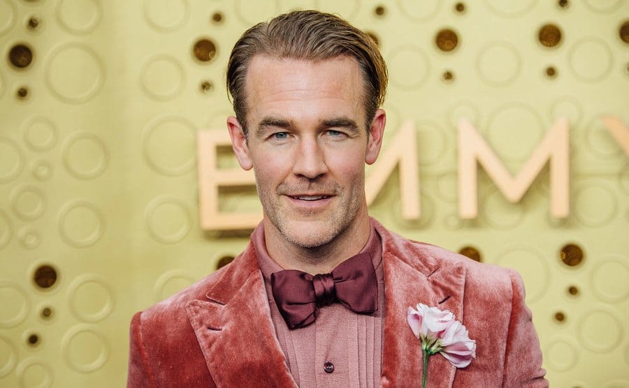 James Van Der Beek on the red carpet in a velour salmon-colored tuxedo