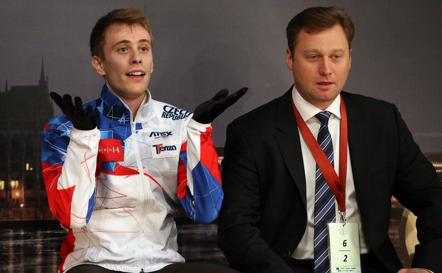 Viktor Petrenko coaching Michal Brezina at a mens figure skating championships
