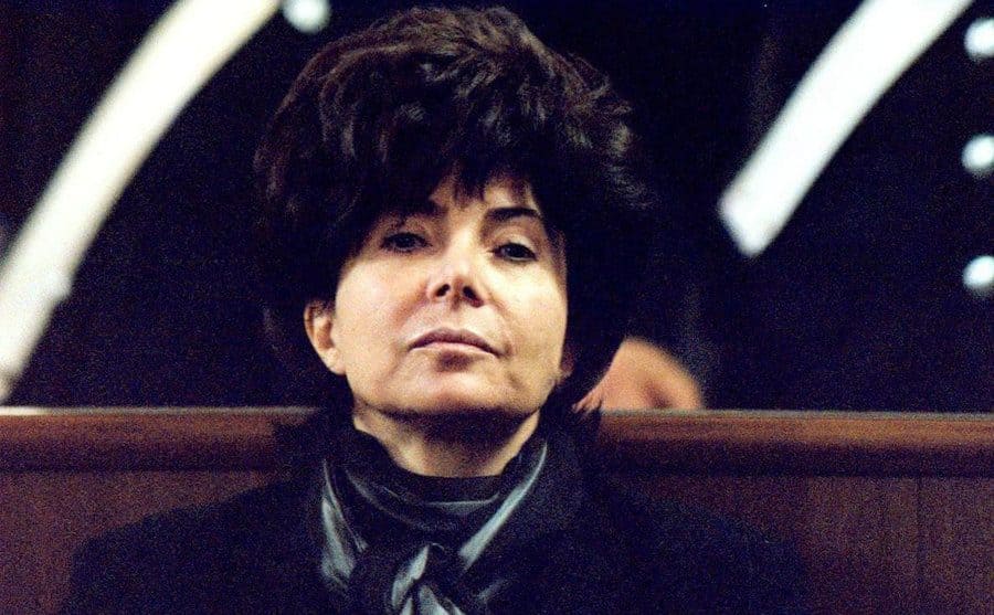 Patrizia Reggiani dressed all in black while she sits in court. 