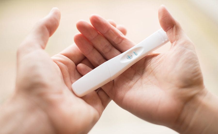 A positive pregnancy test.
