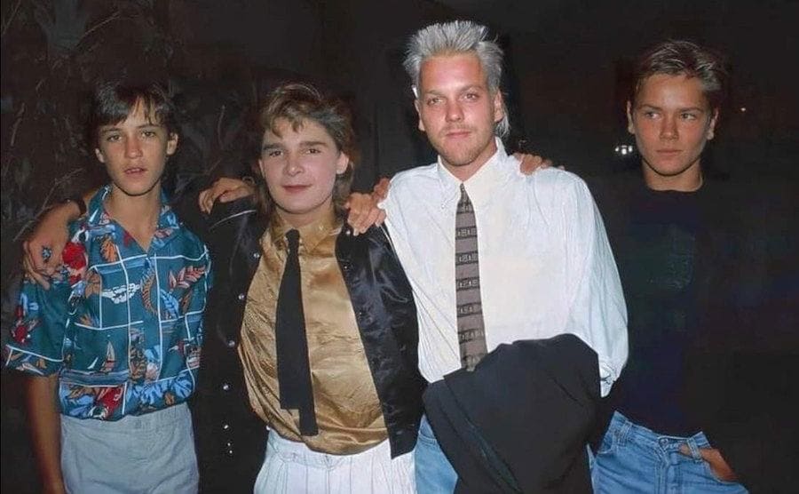 Will Wheaton, Corey Feldman, Kiefer Sutherland, and River Phoenix at a premiere