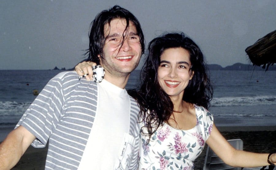 Corey Feldman and Vanessa Marcil are dancing on the beach in Mexico.