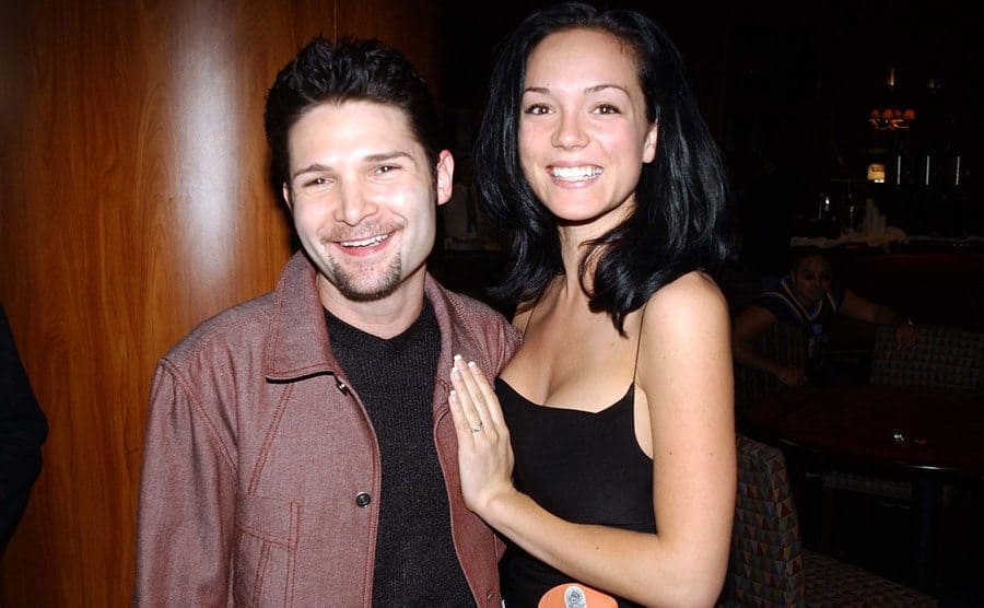 Corey Feldman and Susie Sprague pose backstage.