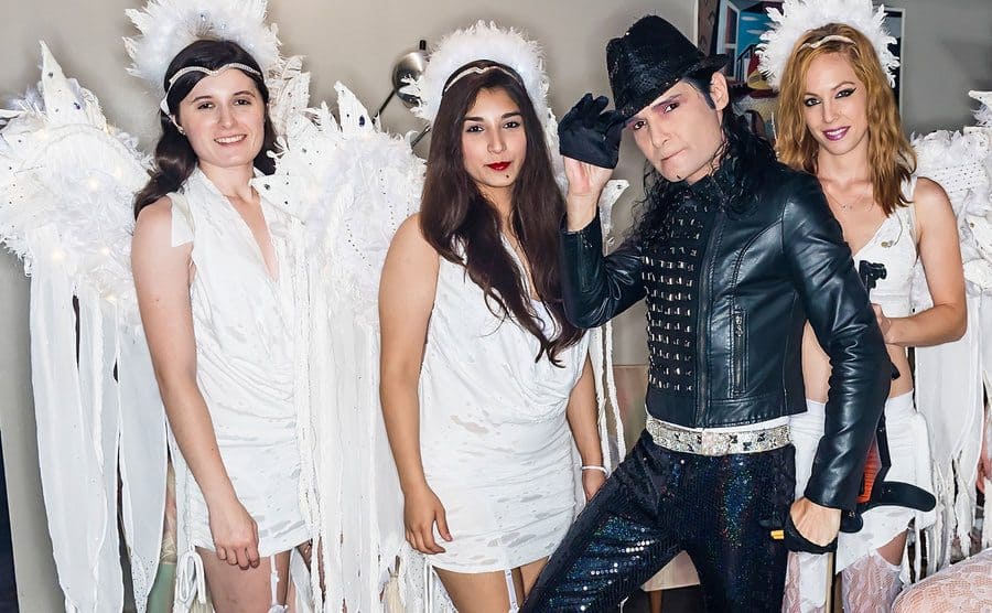Corey Feldman poses backstage with his “Angels”.
