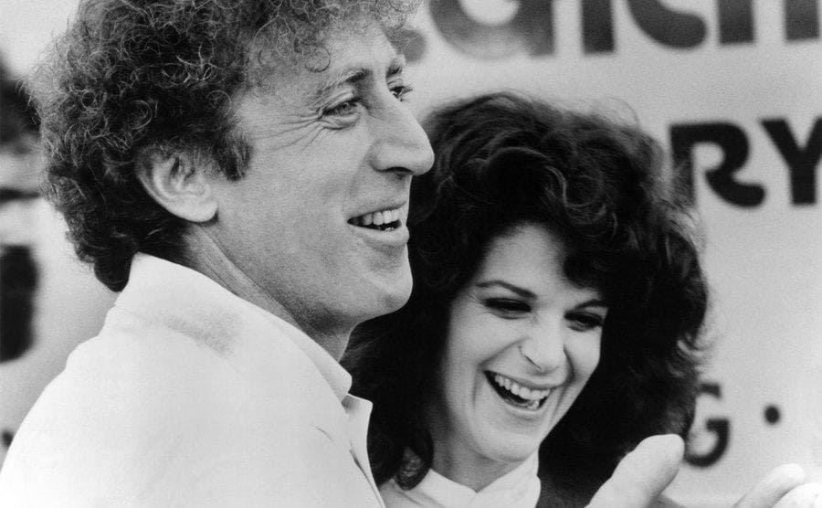 A smiling and laughing moment of Gene and Gilda.
