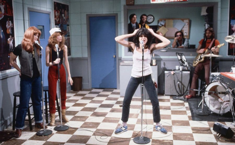Gilda Radner does a comic impersonation of punk rock singer Patti Smith in a sketch from