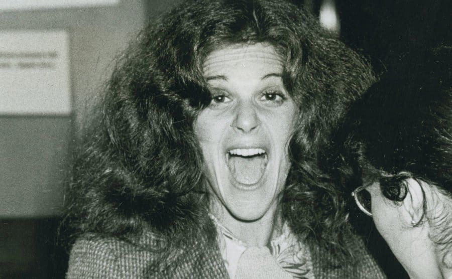 Gilda Radner makes a funny face at the camera.