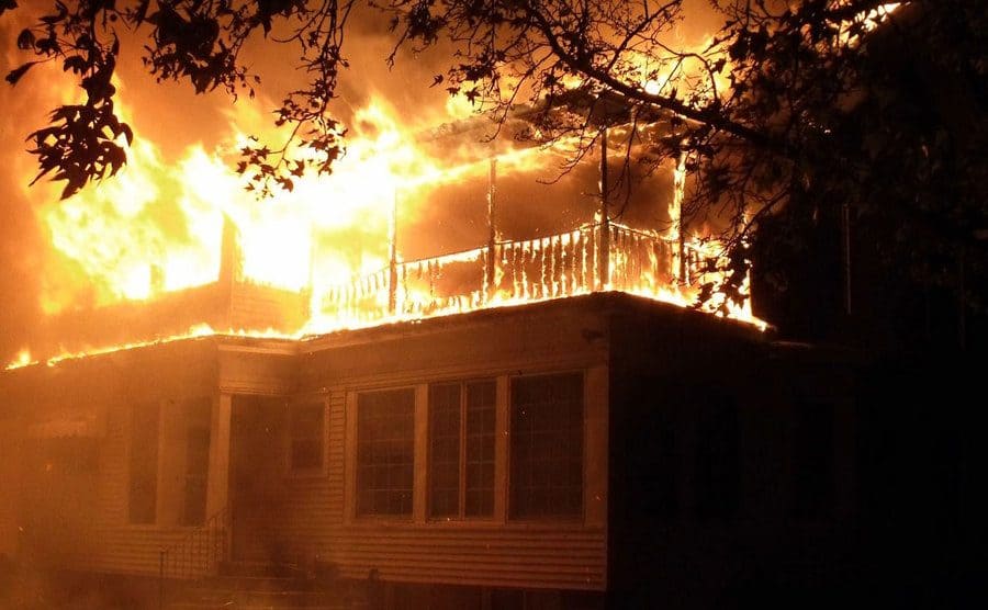 A house going up in flames on the night of the crime.