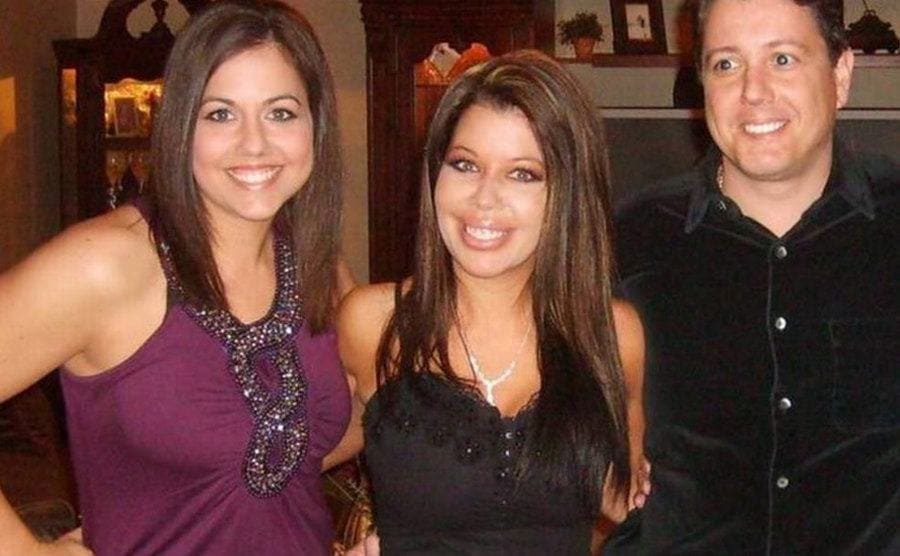 Vashti next to her sister and brother before a night out.