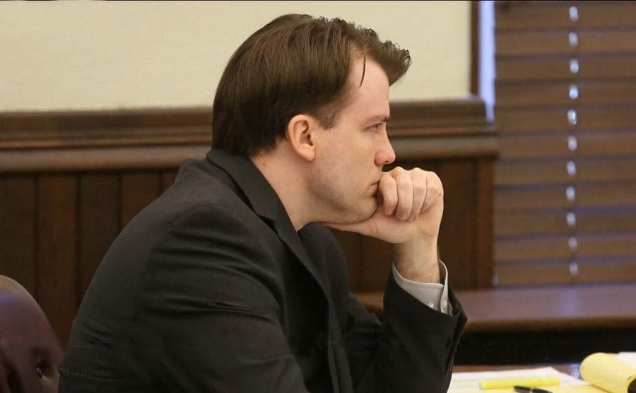 A serious Brett is waiting in the courtroom.